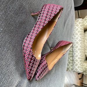 Kitten Hill in red and gray satin type material.